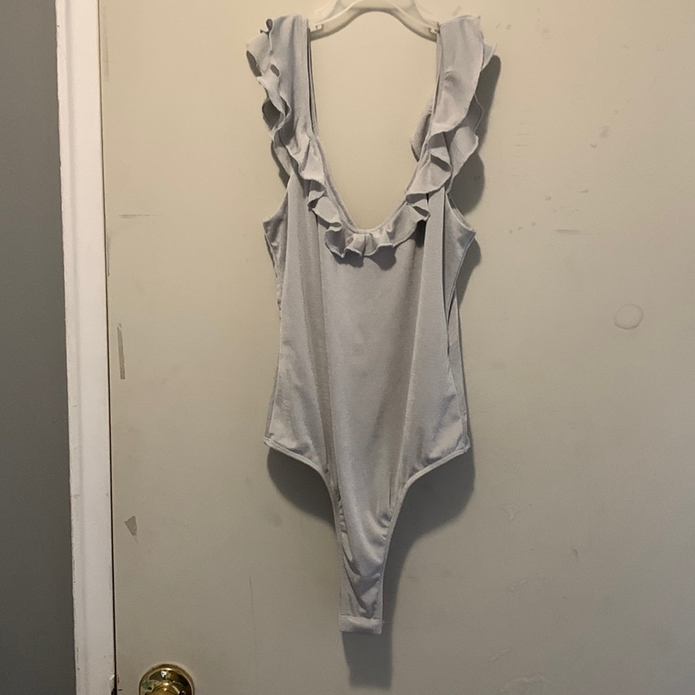 Cute body suit. Silver, with a slight shine to it.